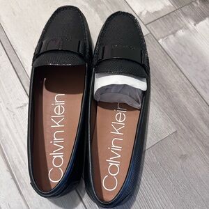 Calvin Klein women's Slip-Ons